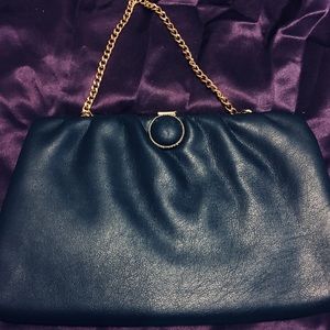 Pretty dark blue evening bag with gold chain strap